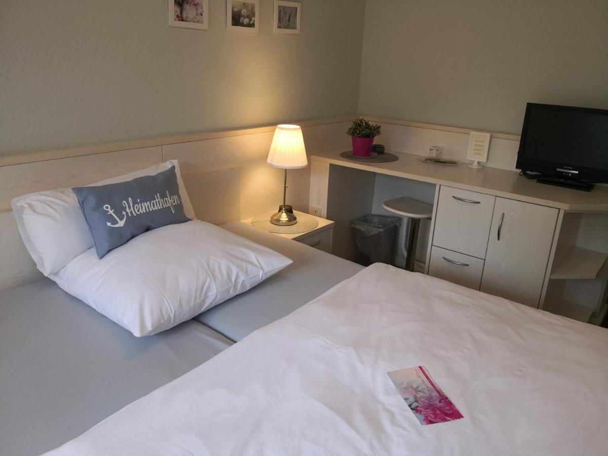 Hotel Garni Haus Am Meer Neuharlingersiel Esterno foto