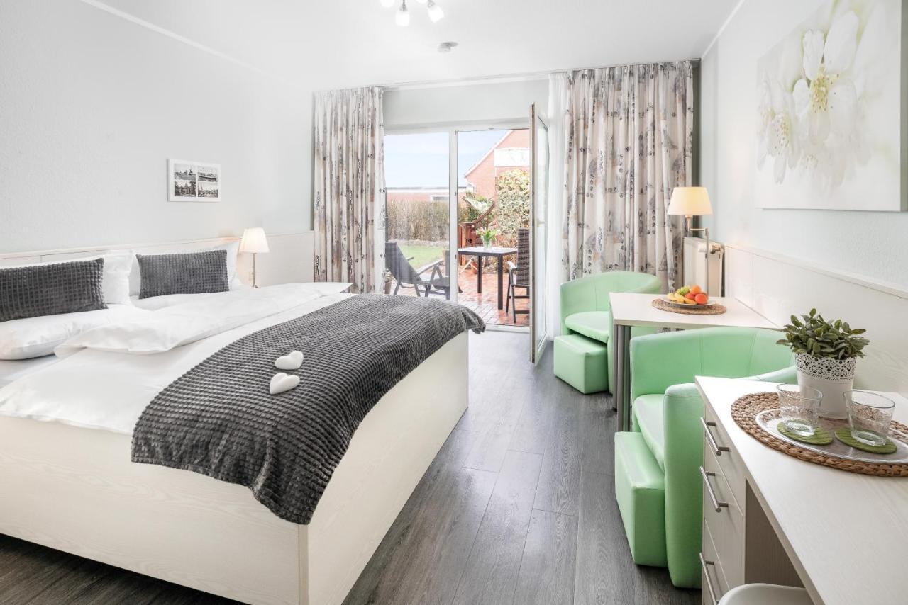 Hotel Garni Haus Am Meer Neuharlingersiel Esterno foto