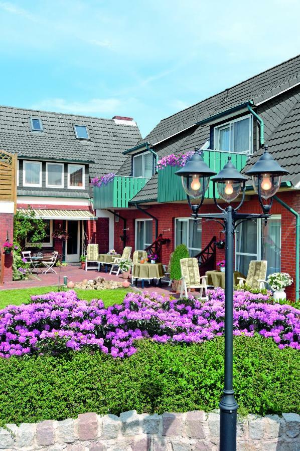 Hotel Garni Haus Am Meer Neuharlingersiel Esterno foto
